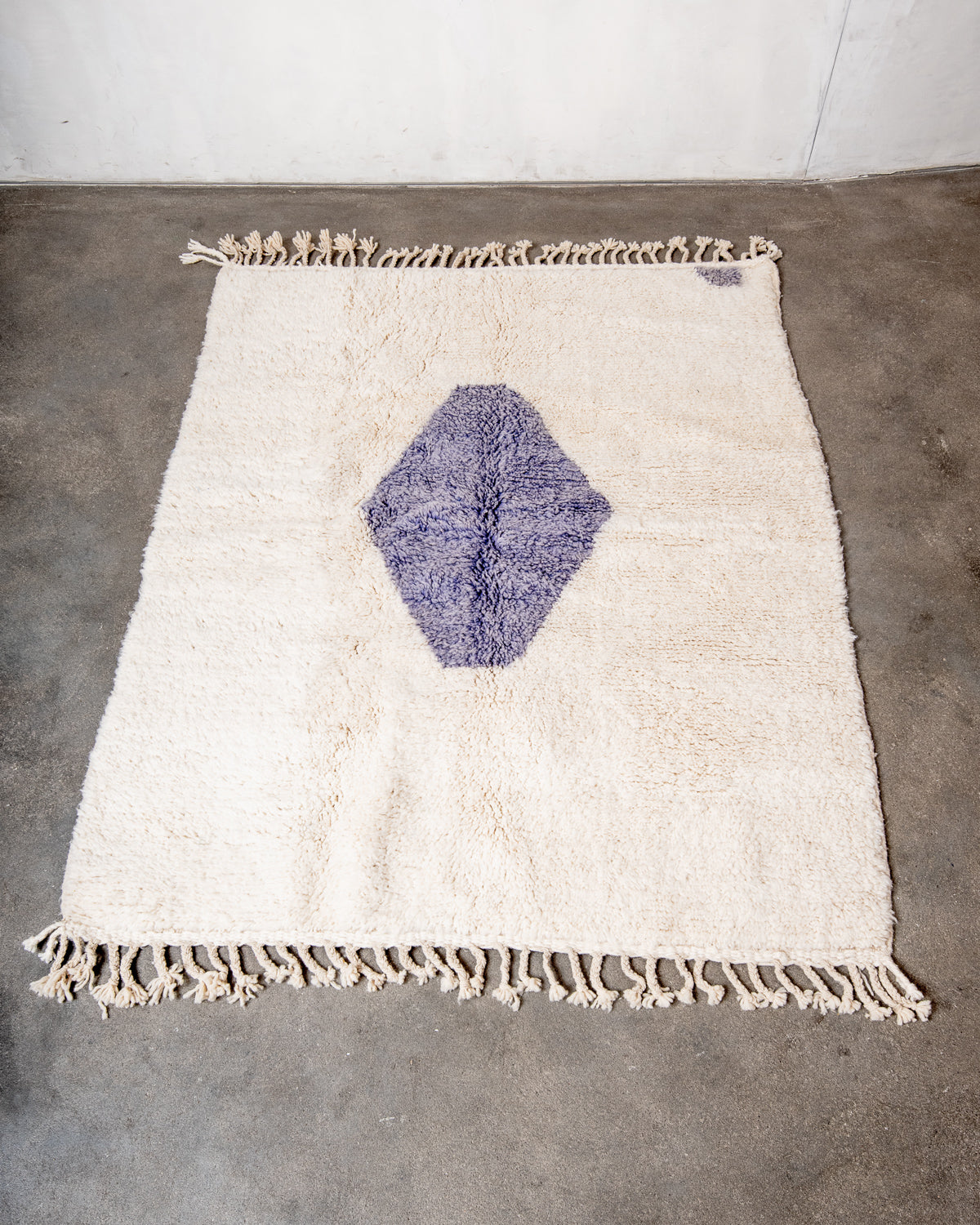 Modern, designer, handcrafted Berber rug from Morocco. Beniourain carpet with beautiful colours and patterns and fluffy wool texture.
